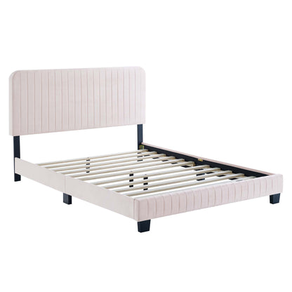 Red performance-velvet upholstered king platform bed with a tall channel-tufted headboard, black legs and a wooden slat base.