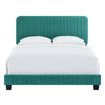 Teal velvet platform bed with tall vertical-channel headboard and footboard, white bedding, modern bedroom design.