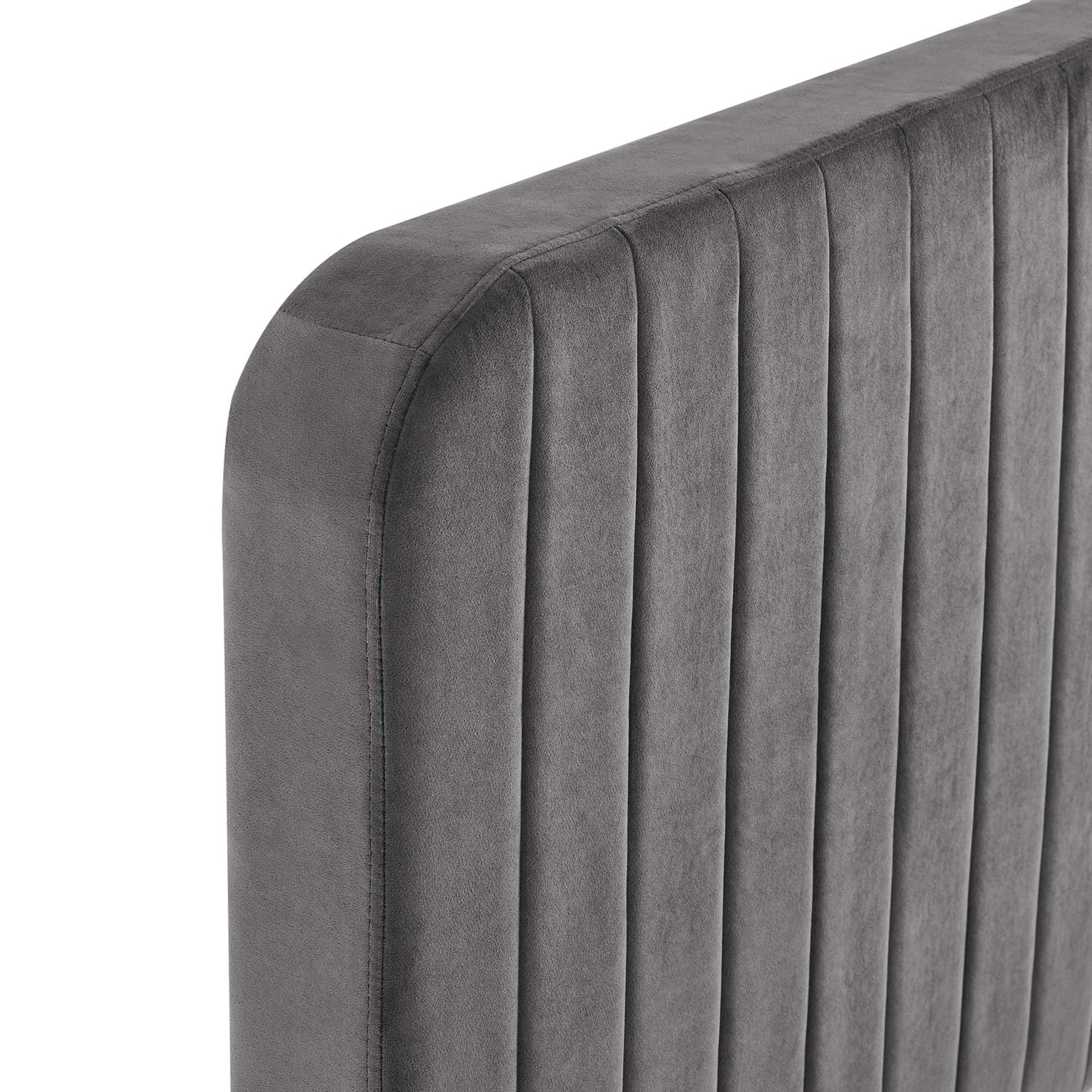 Grey velvet full platform bed with a vertical channel-tufted headboard and rounded corners.