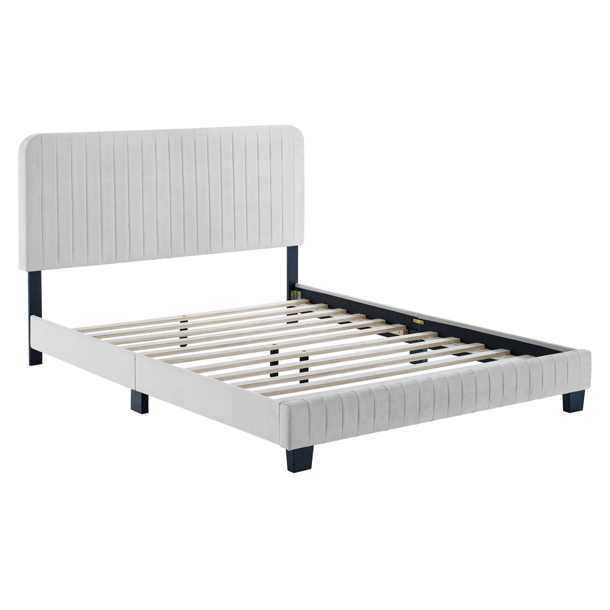 Light gray upholstered full platform bed with vertical channel-tufted headboard and footboard, slatted base, dark legs.