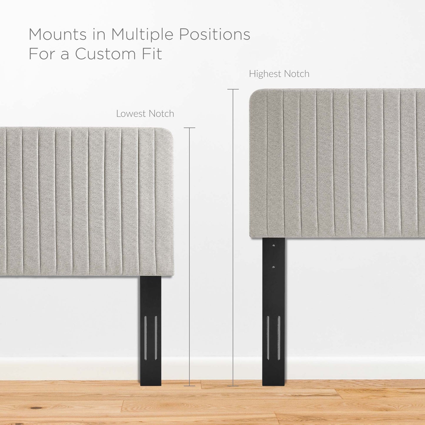 Oat-gray upholstered headboard panels with vertical channel tufting on adjustable black metal legs.