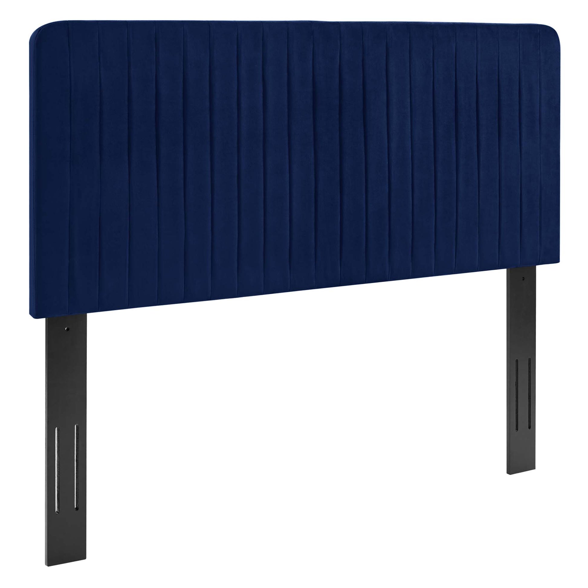 Navy blue upholstered headboard with vertical channel quilting and dark metal legs.