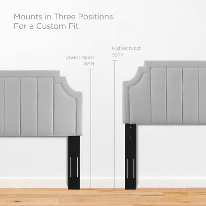 Light gray upholstered headboard with vertical channels; mounts in three positions, 49–53 inches high.
