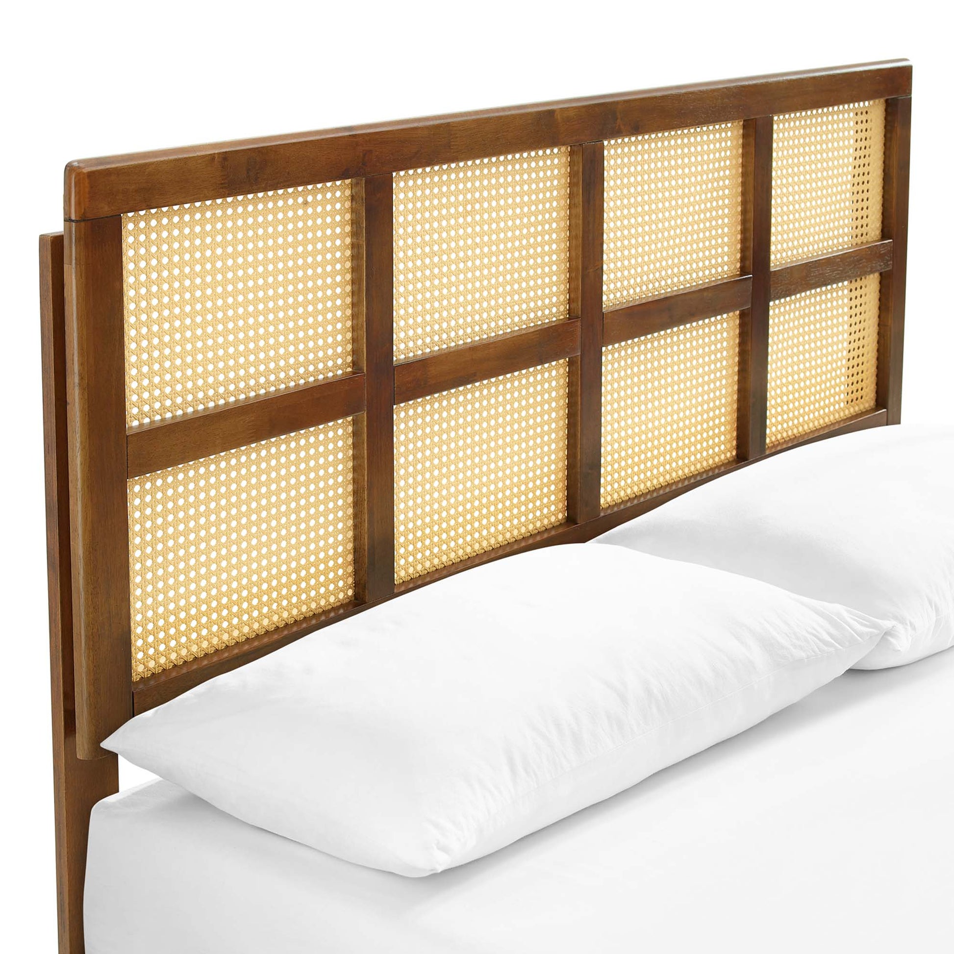 Dark walnut wood platform bed with woven cane panels in a grid design and angular legs.