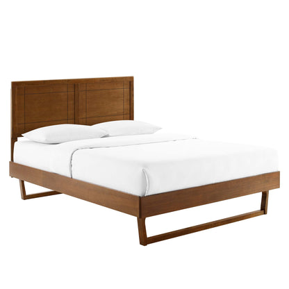 Walnut wood queen platform bed with an angular frame and white bedding.
