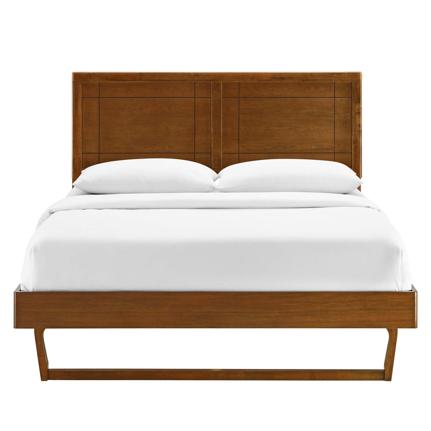 Walnut wood platform bed with paneled headboard, angular frame, white bedding.