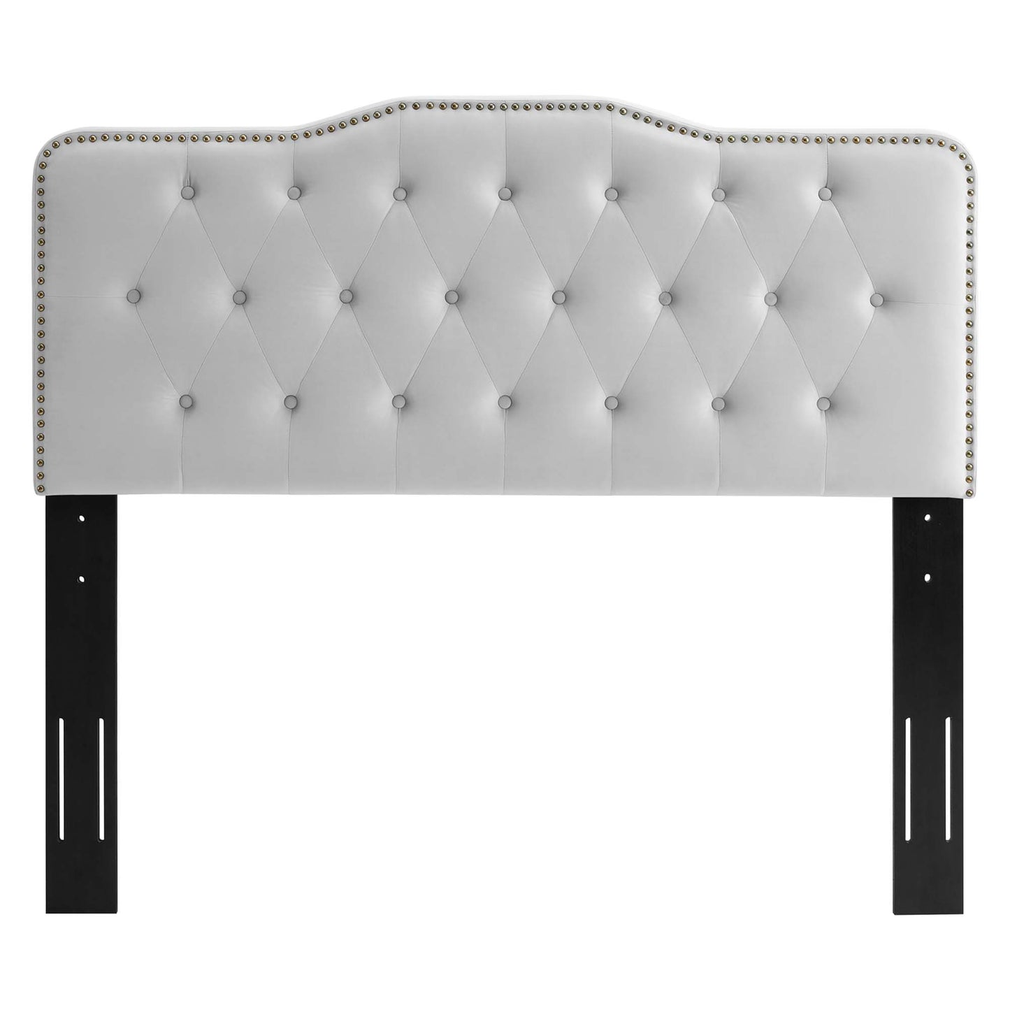 Gray tufted headboard with diamond stitching, nailhead trim, and black metal legs.