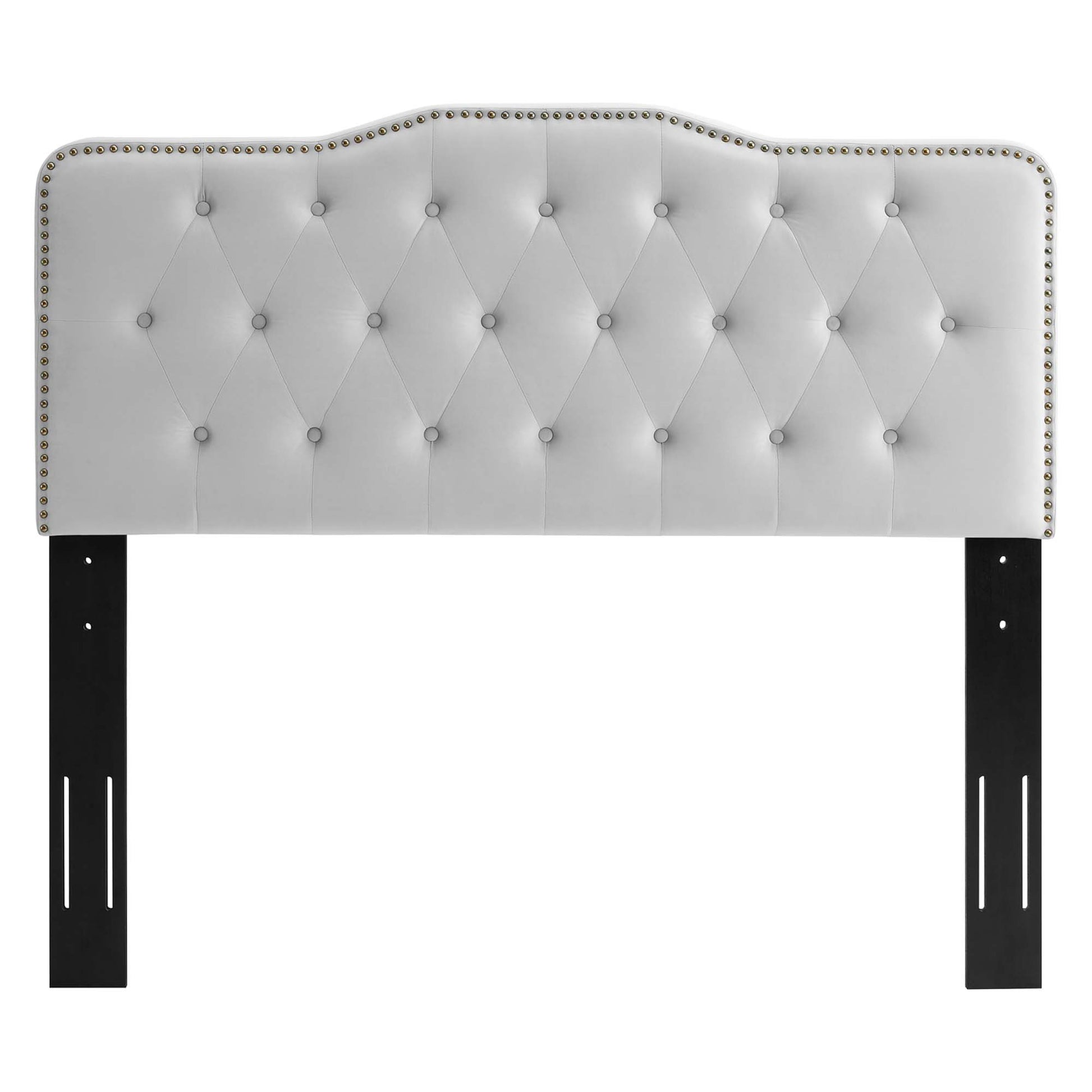 Gray tufted headboard with diamond stitching, nailhead trim, and black metal legs.