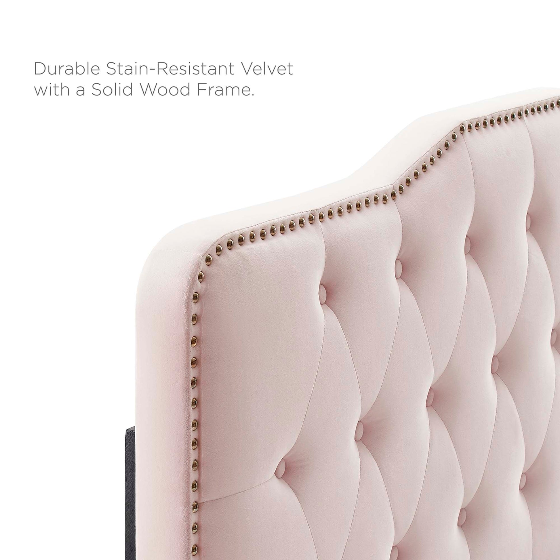 Light pink velvet tufted twin headboard with diamond buttons and brass nailhead trim along the edge, solid wood frame.