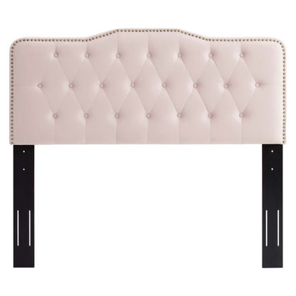 Red tufted upholstered headboard with diamond pattern, nailhead trim along edges, curved top, and black legs.
