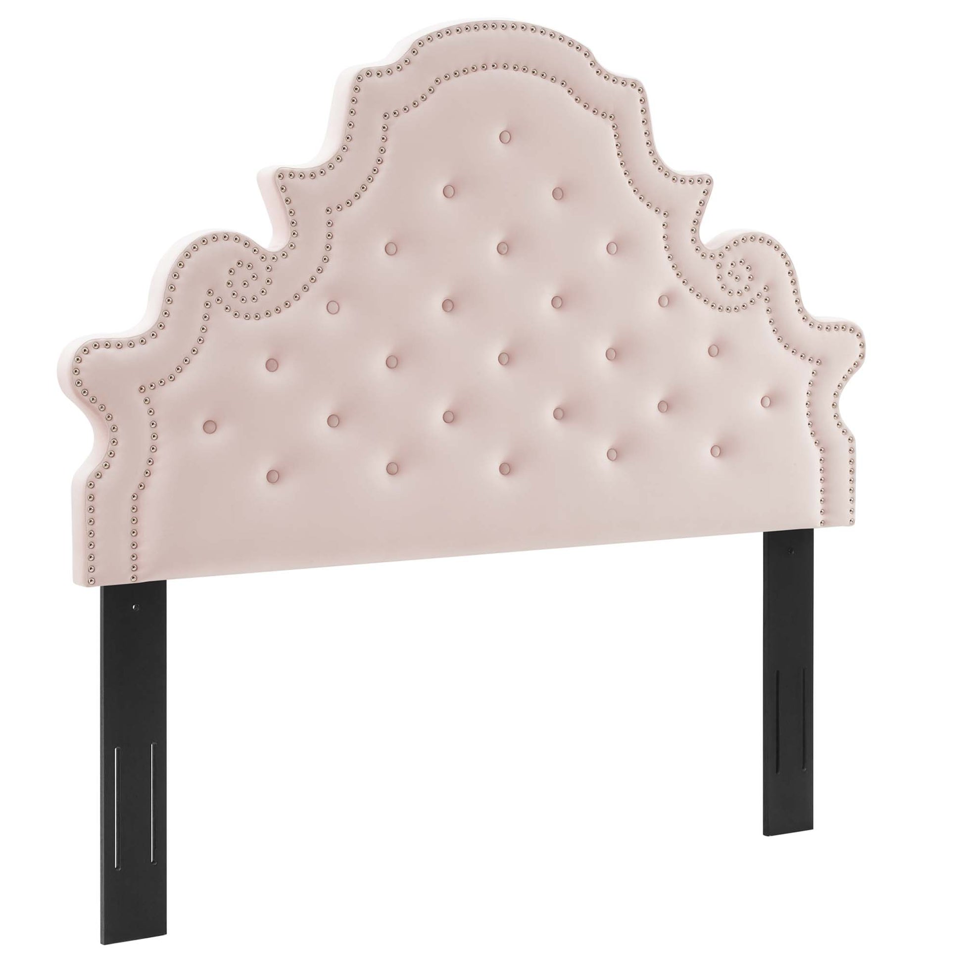 Red tufted headboard with scalloped silhouette, nailhead trim and black wooden legs