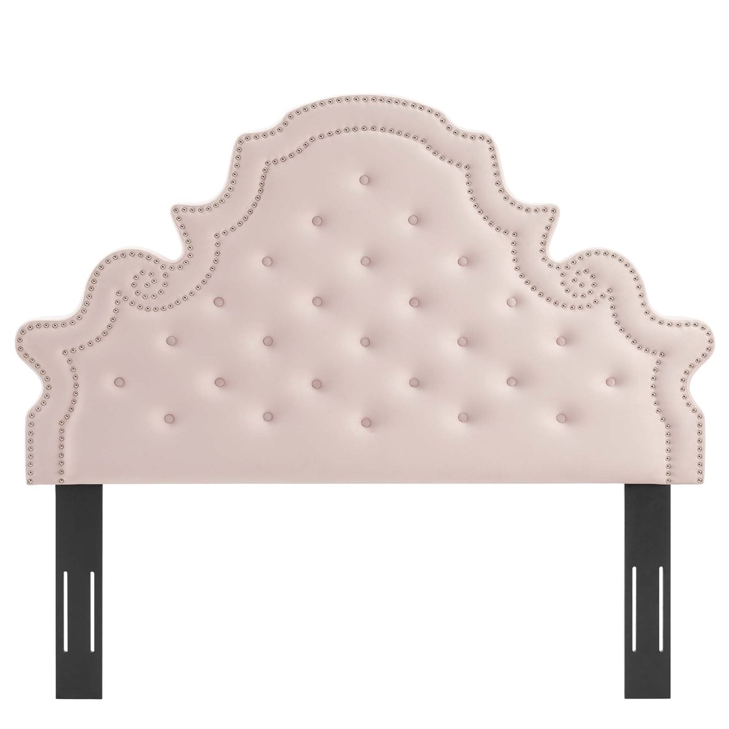Red tufted upholstered headboard with ornate scalloped silhouette and nailhead trim, supported by black metal legs.