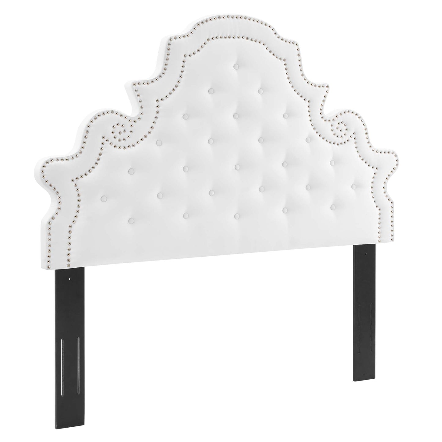 White tufted velvet headboard with nailhead trim and ornate scalloped silhouette on black legs