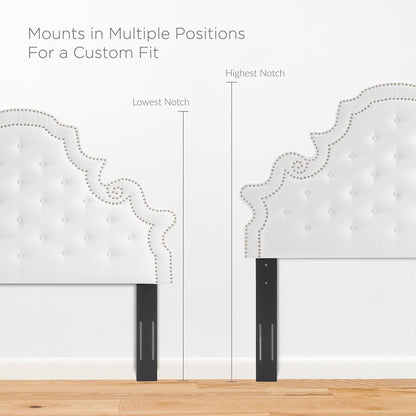White tufted velvet headboard with scalloped nailhead trim and adjustable black metal posts for a custom fit.