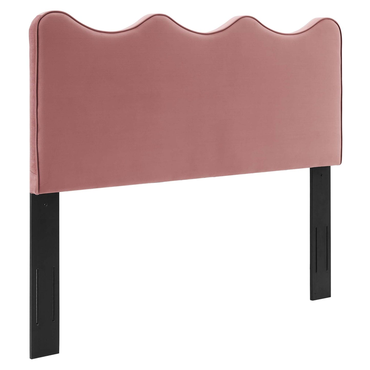 Red velvet upholstered headboard with a scalloped wavy top and black rectangular legs