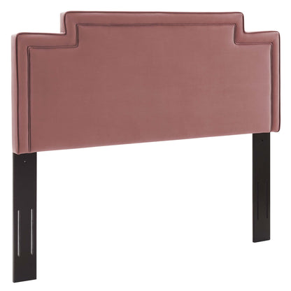 Dusty rose upholstered headboard with stepped, layered edge on black legs with slot details