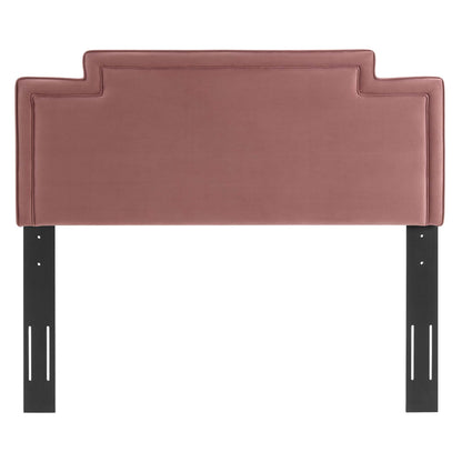 Dusty rose upholstered headboard with stepped top edges and black metal legs.