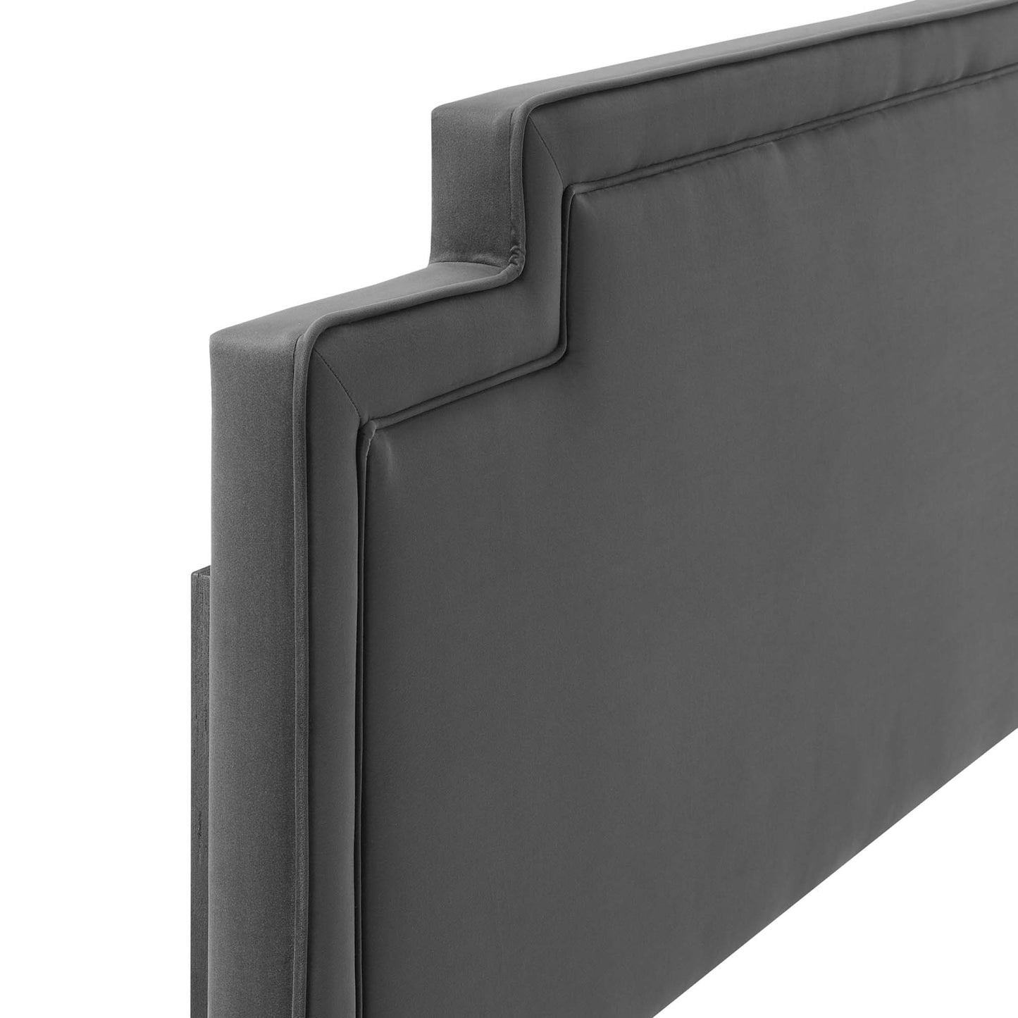 Dark gray upholstered headboard with a stepped notch edge and thick padding; modern, contemporary style.