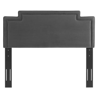 Charcoal gray upholstered headboard with stepped architectural silhouette & black metal legs.