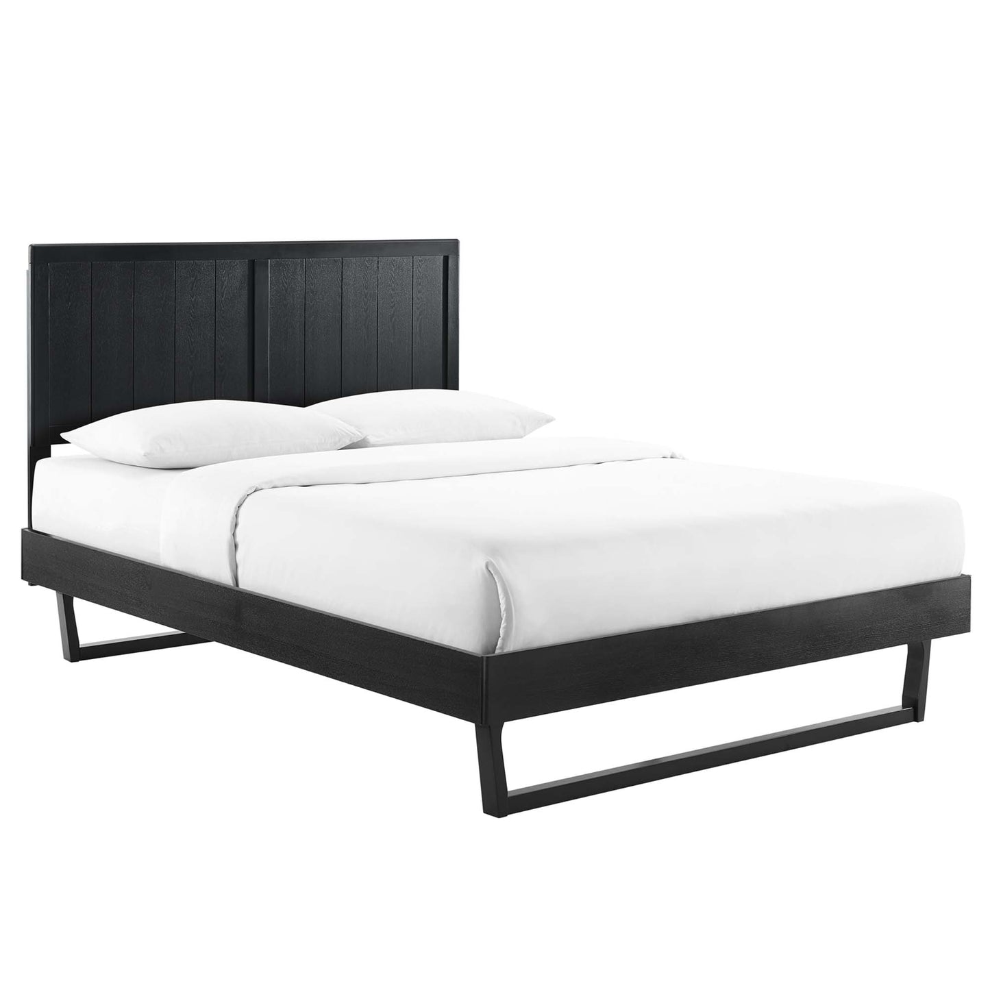 Black platform bed with a tall paneled headboard and slim rectangular legs, dressed in white sheets and pillows.