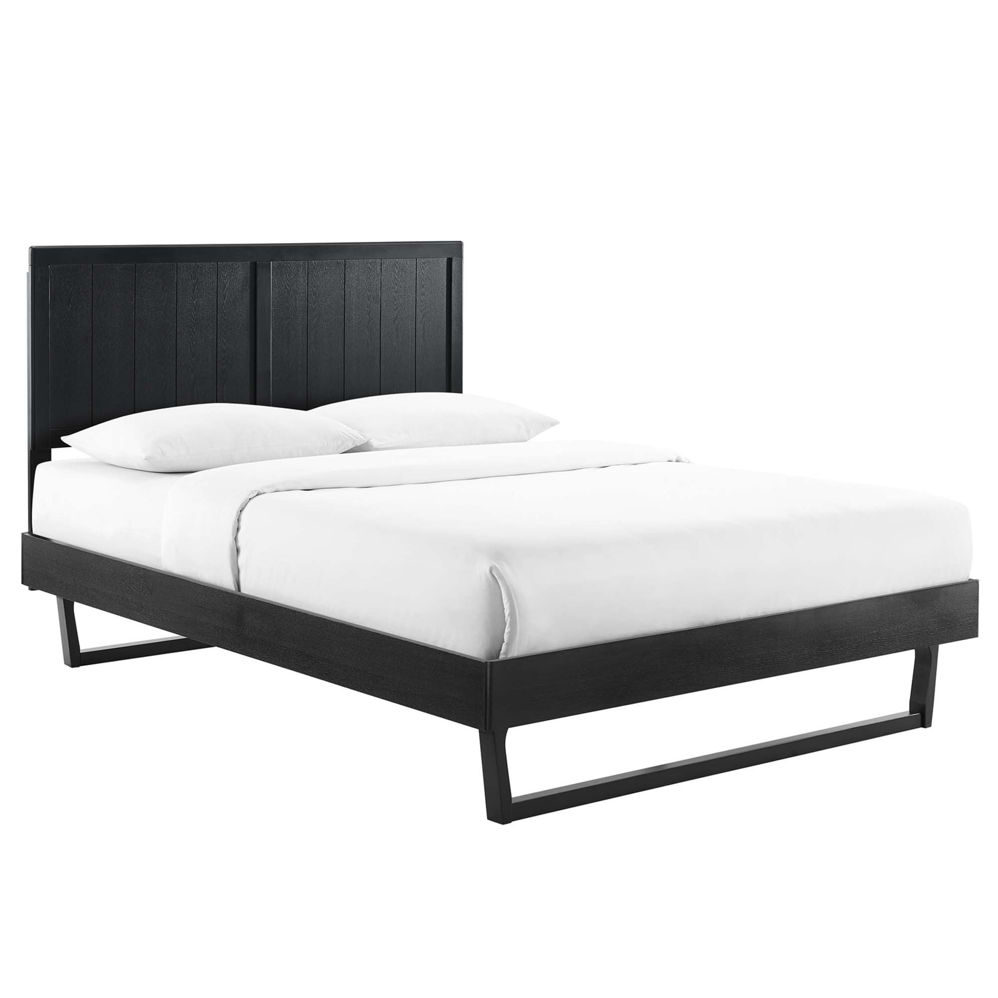 Black platform bed with a tall paneled headboard and slim rectangular legs, dressed in white sheets and pillows.