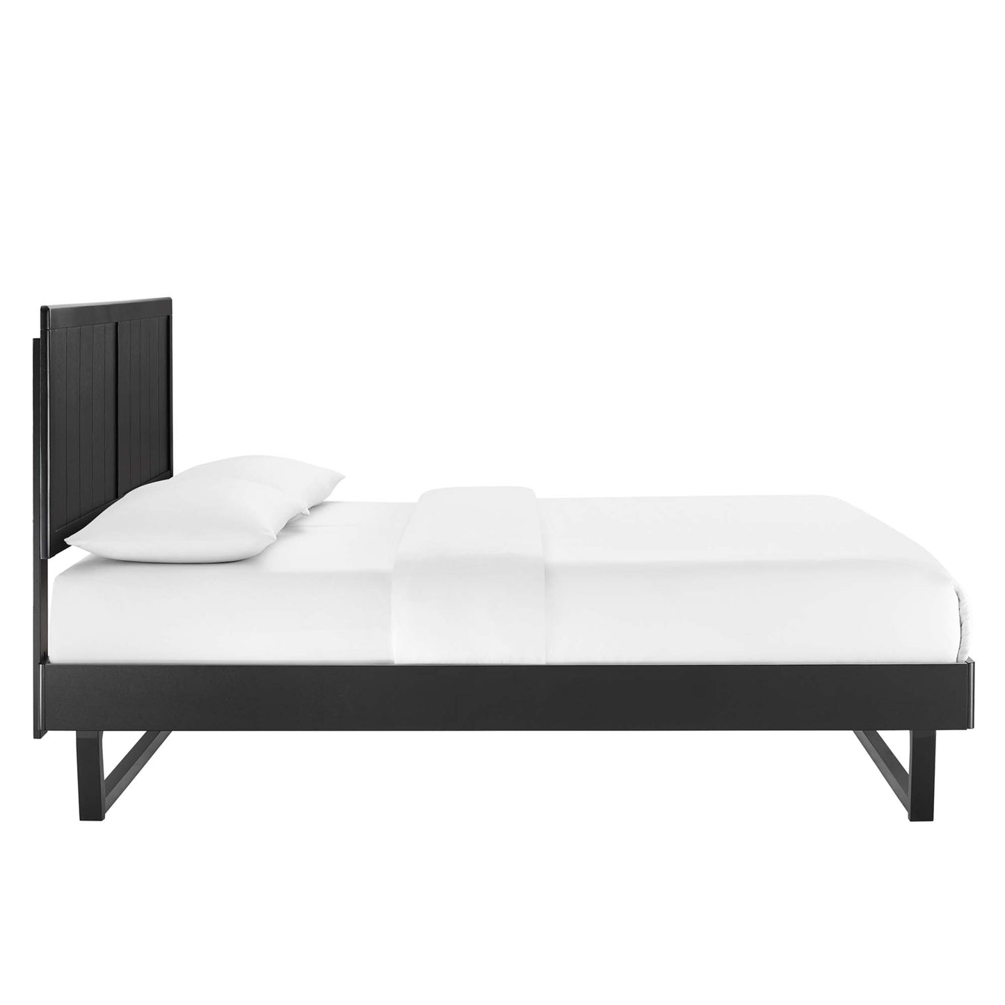 Black wood full platform bed with angular frame and white bedding.