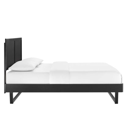 Black wood full platform bed with angular frame and white bedding.