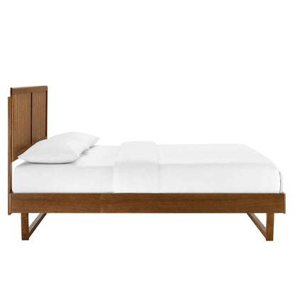 Walnut-finish platform bed with angular frame, low-profile design, white bedding.