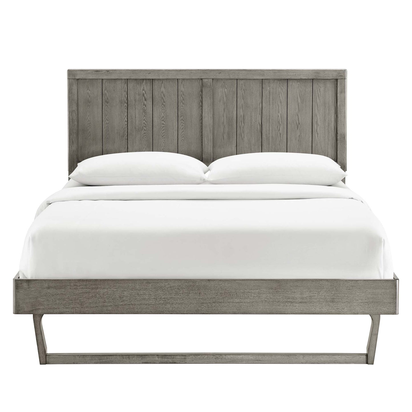 Grey weathered wood platform bed with tall vertical-plank headboard and slim leg base, white bedding.