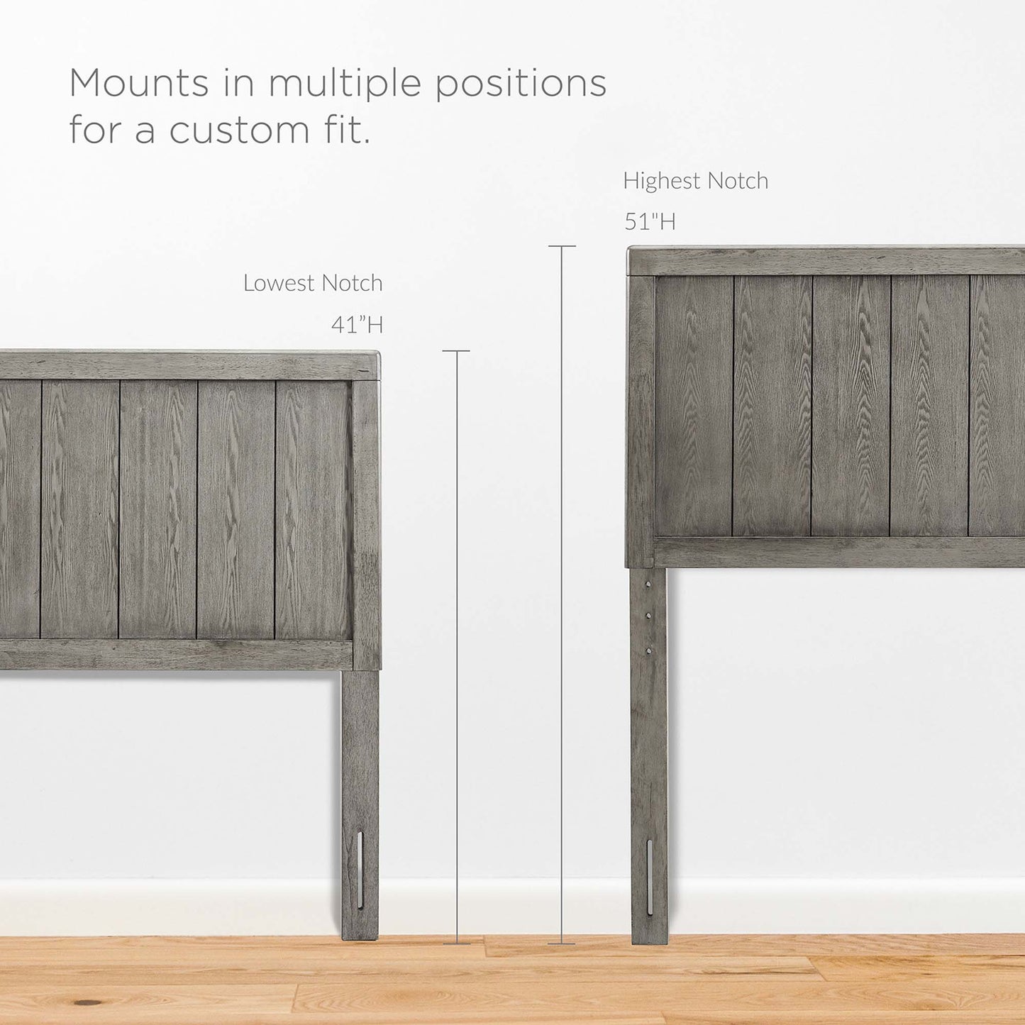 Graywashed wood king platform bed with an angular frame.