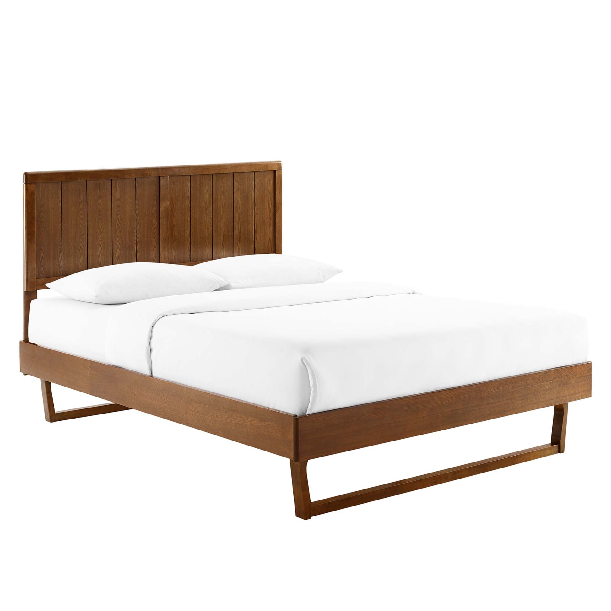 Walnut-finish wooden twin platform bed with angular frame and low-profile design, white bedding.