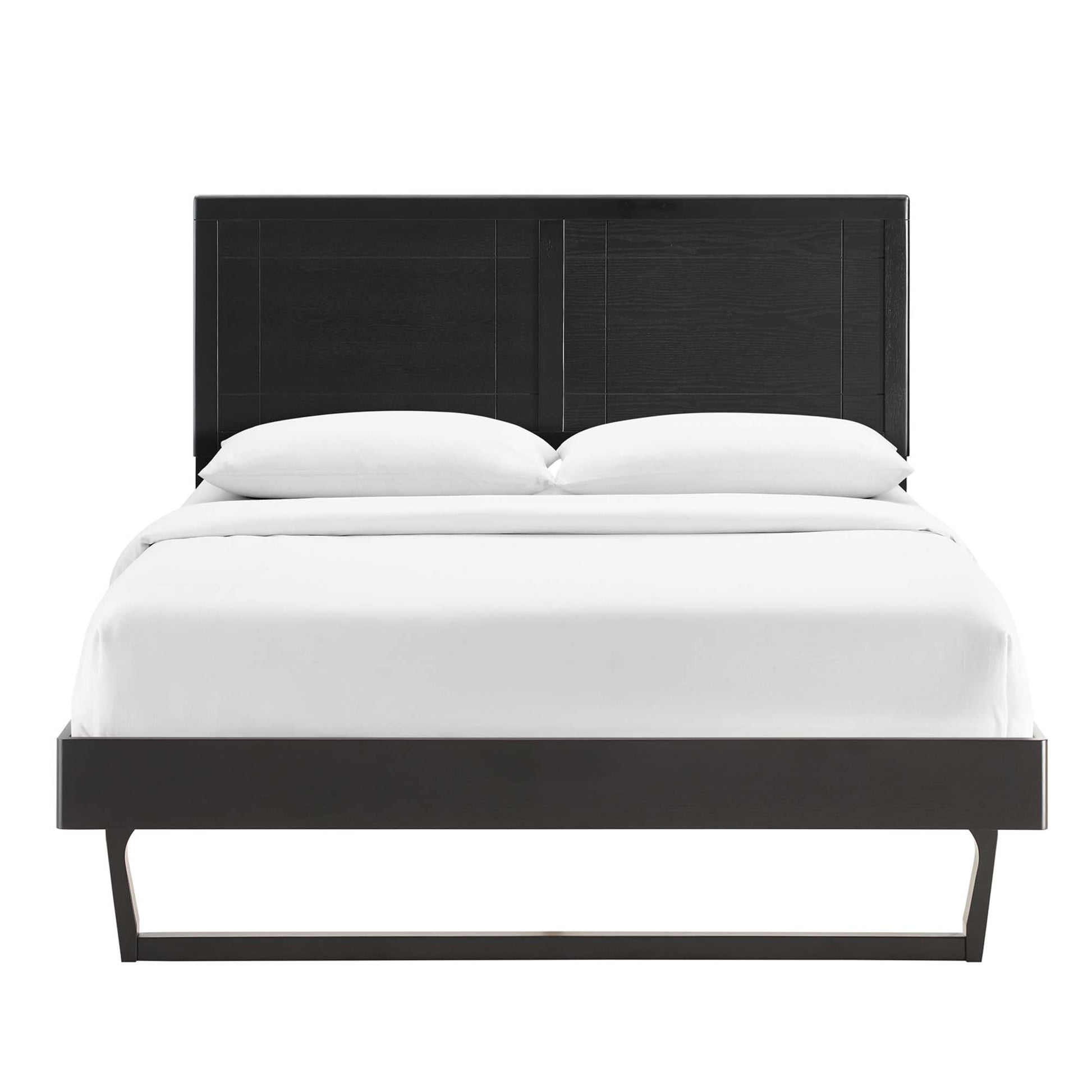 Black platform bed with rectangular paneled headboard and low footboard, white bedding.