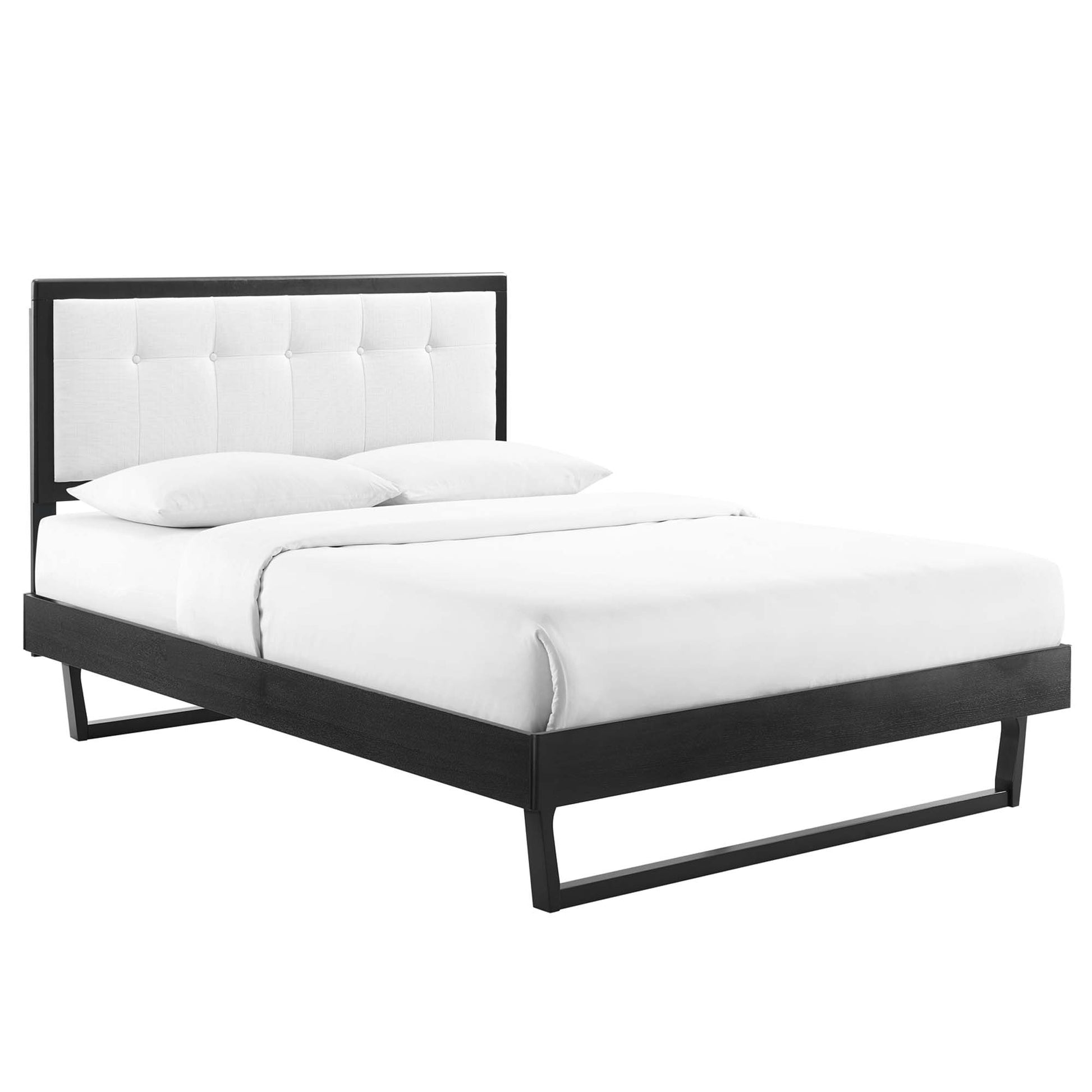 Modern black platform bed with white tufted headboard and crisp white bedding, sleek low-profile frame.