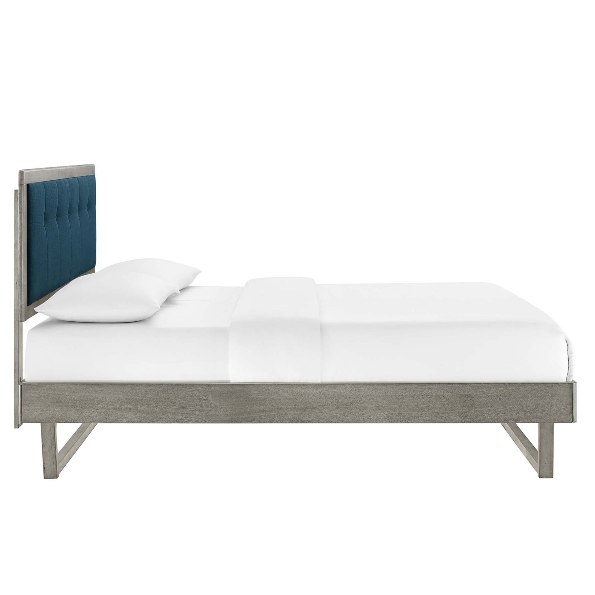 Gray Azure Willow Wood king platform bed with an angular frame, dressed in white linens.