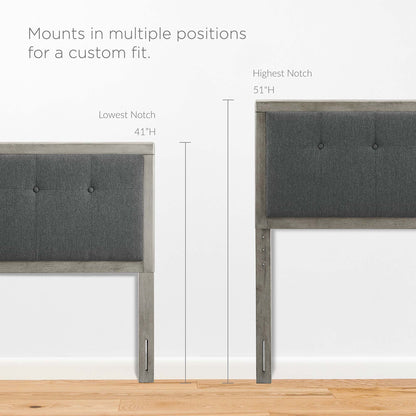 Gray charcoal king platform bed with an angular wood frame.