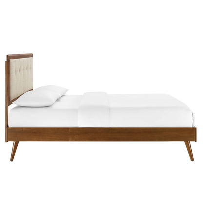 Walnut wood full platform bed with splayed legs & white bedding.