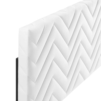 White twin velvet headboard with chevron tufting, edge view.