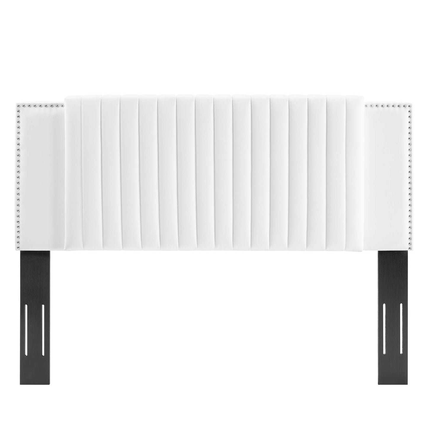 White tufted headboard with vertical channel tufting, nailhead trim on side wings, and dark legs.