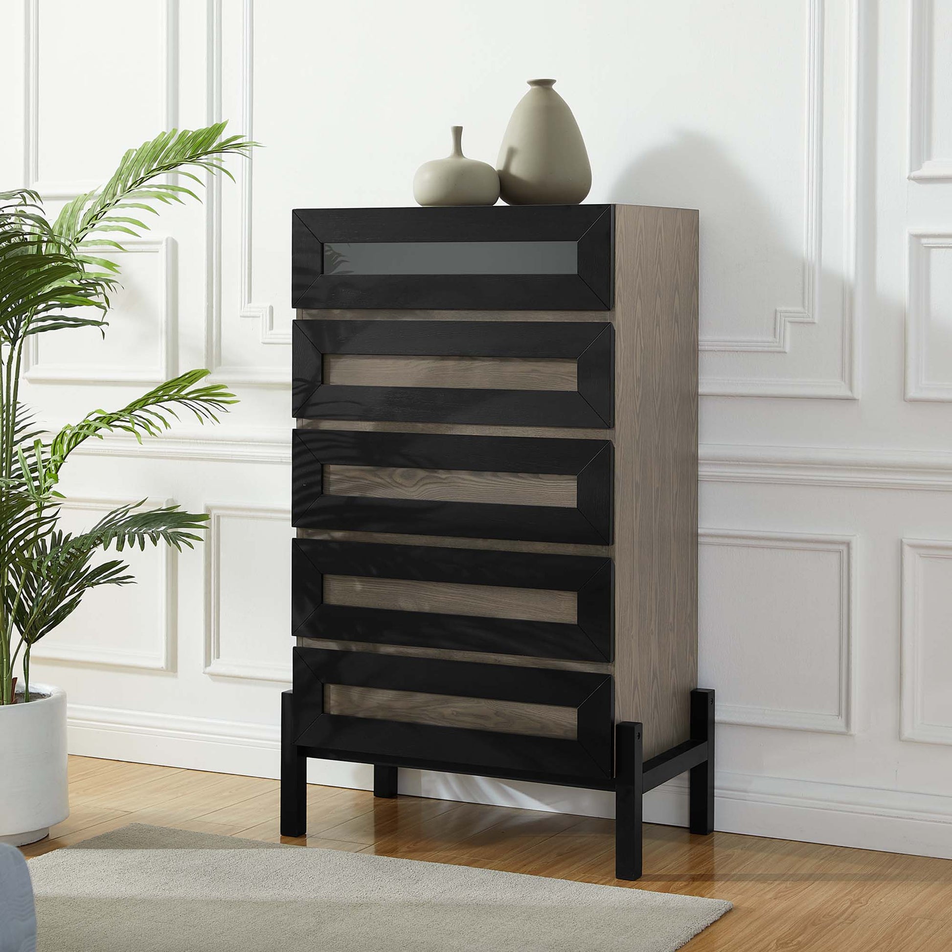 Oak veneer tall chest with black framed drawers & a black metal base, modern storage.