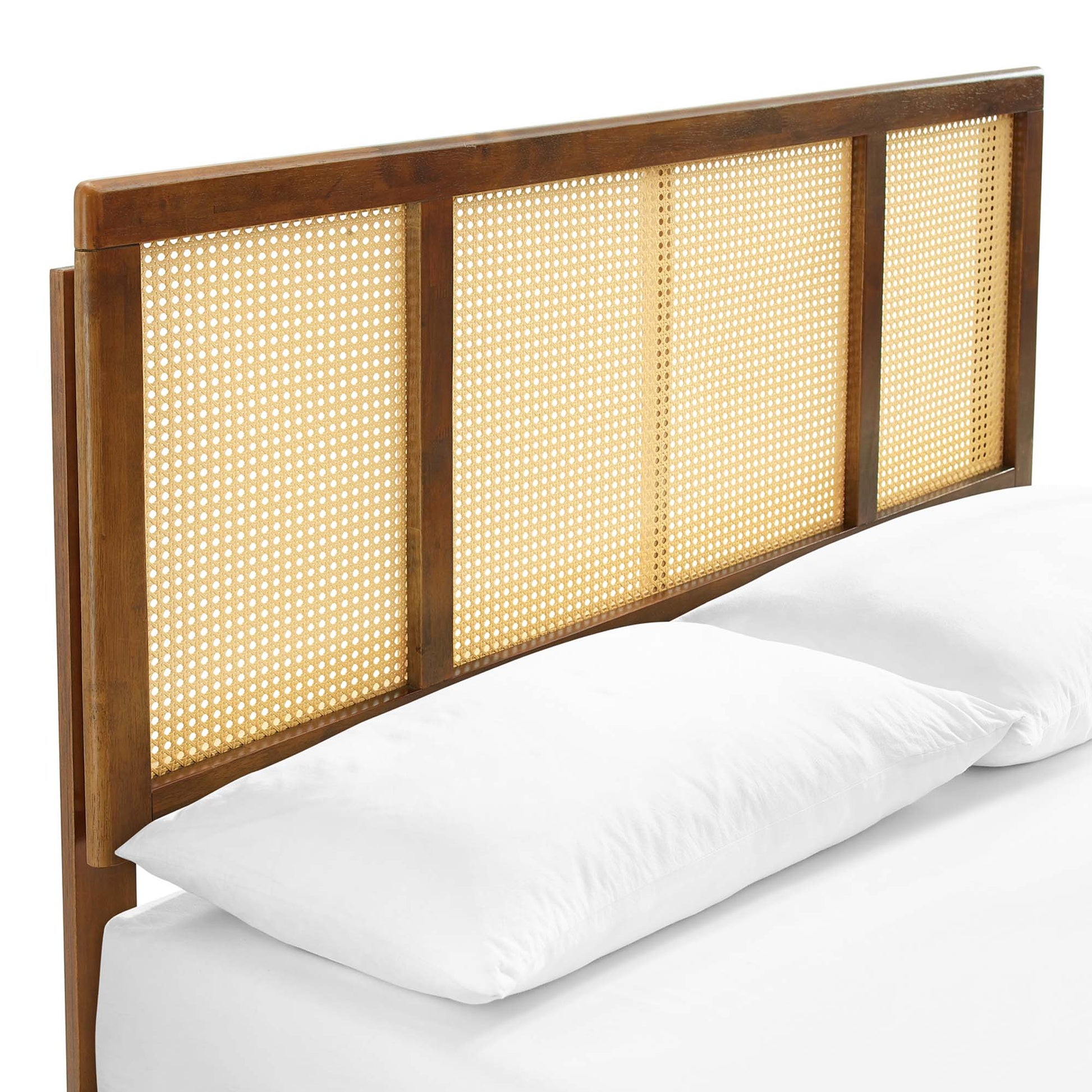 Walnut wood headboard with four woven cane panels, curved top, for a rustic bedroom bed.