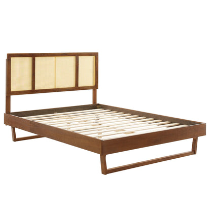 Walnut wood king platform bed with a slatted base, angular legs, and a four-panel cane headboard in a mid-century modern style.