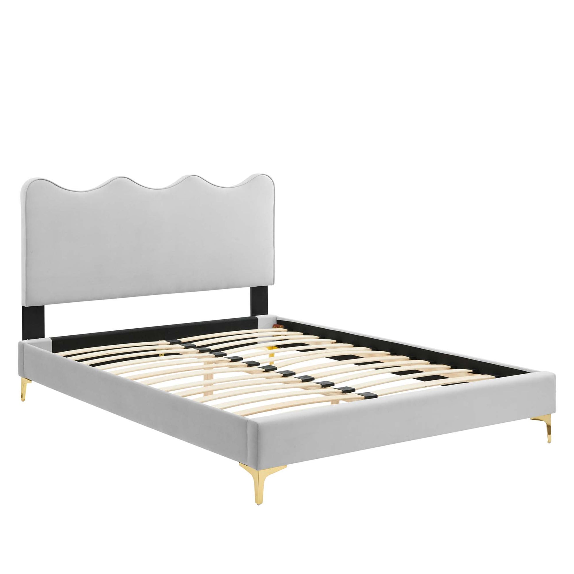 Grey velvet twin platform bed frame with a wavy headboard, black side rails, natural wood slats & gold tapered feet