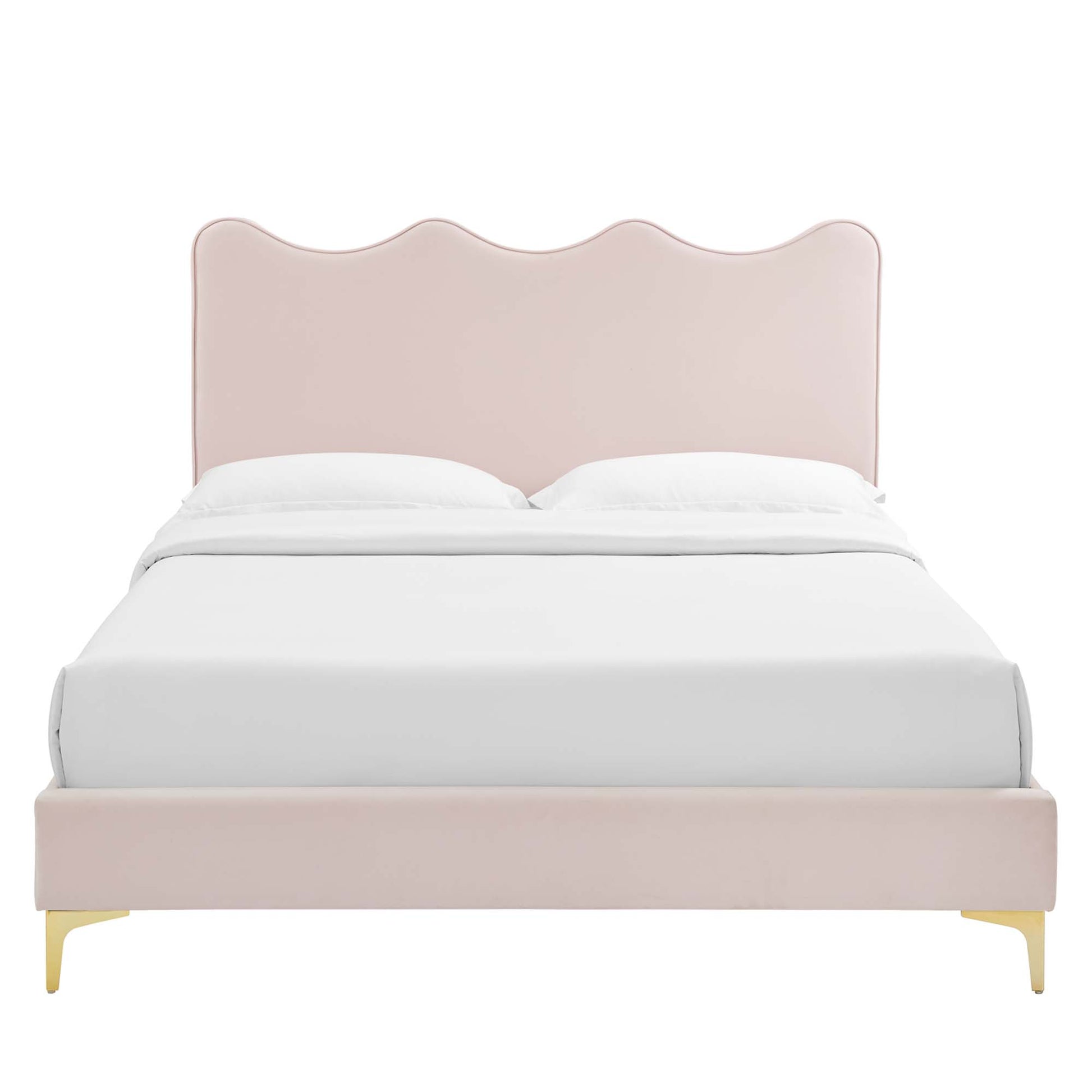 Blush pink upholstered bed with scalloped headboard, white bedding, gold legs, modern glam style.