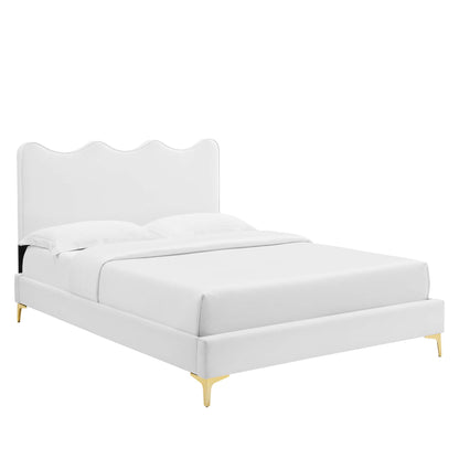 White velvet full platform bed with an upholstered headboard; modern luxury style.