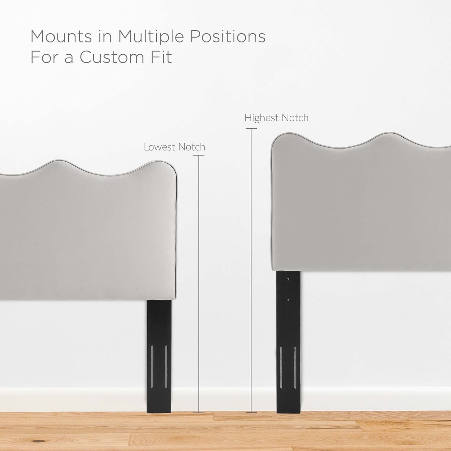 Grey upholstered bed headboard panels with curved tops and black metal legs featuring vertical notches for height adjustment.