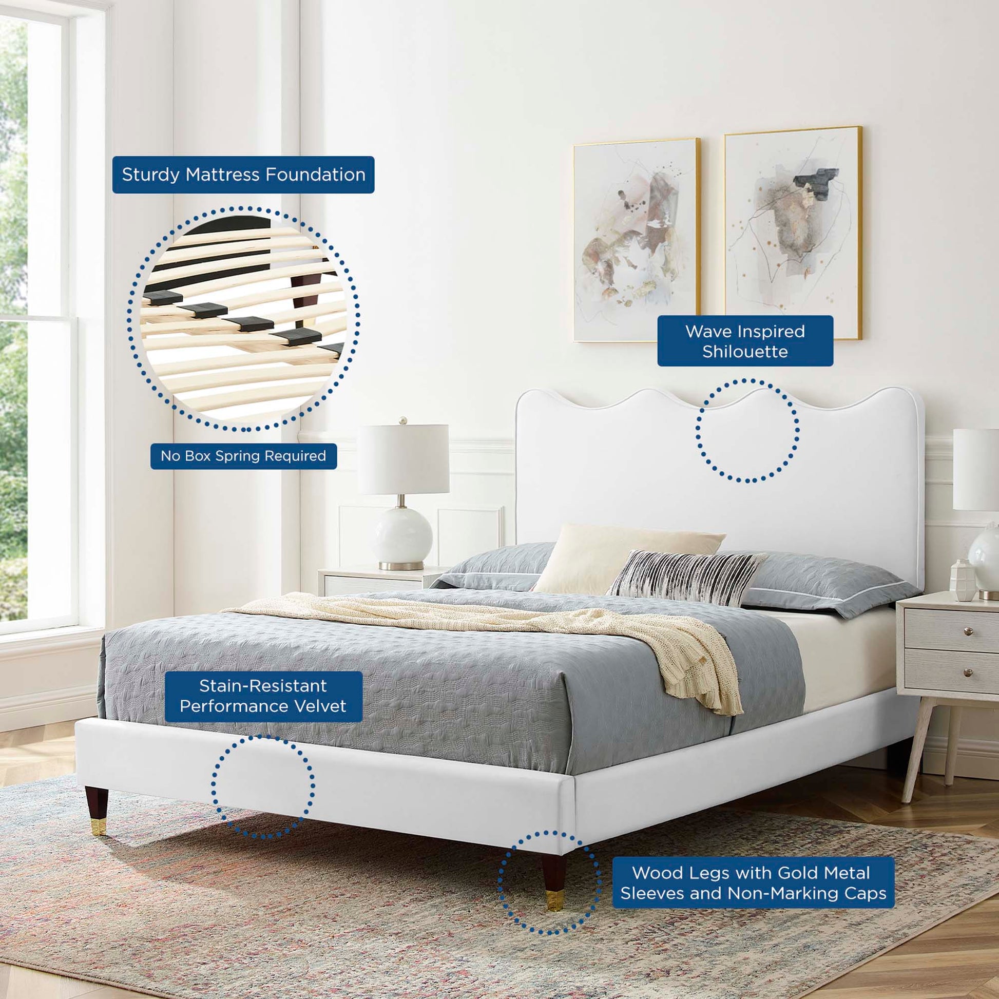 White upholstered platform bed with wave-inspired curved headboard, velvet fabric, wooden legs with gold sleeves.