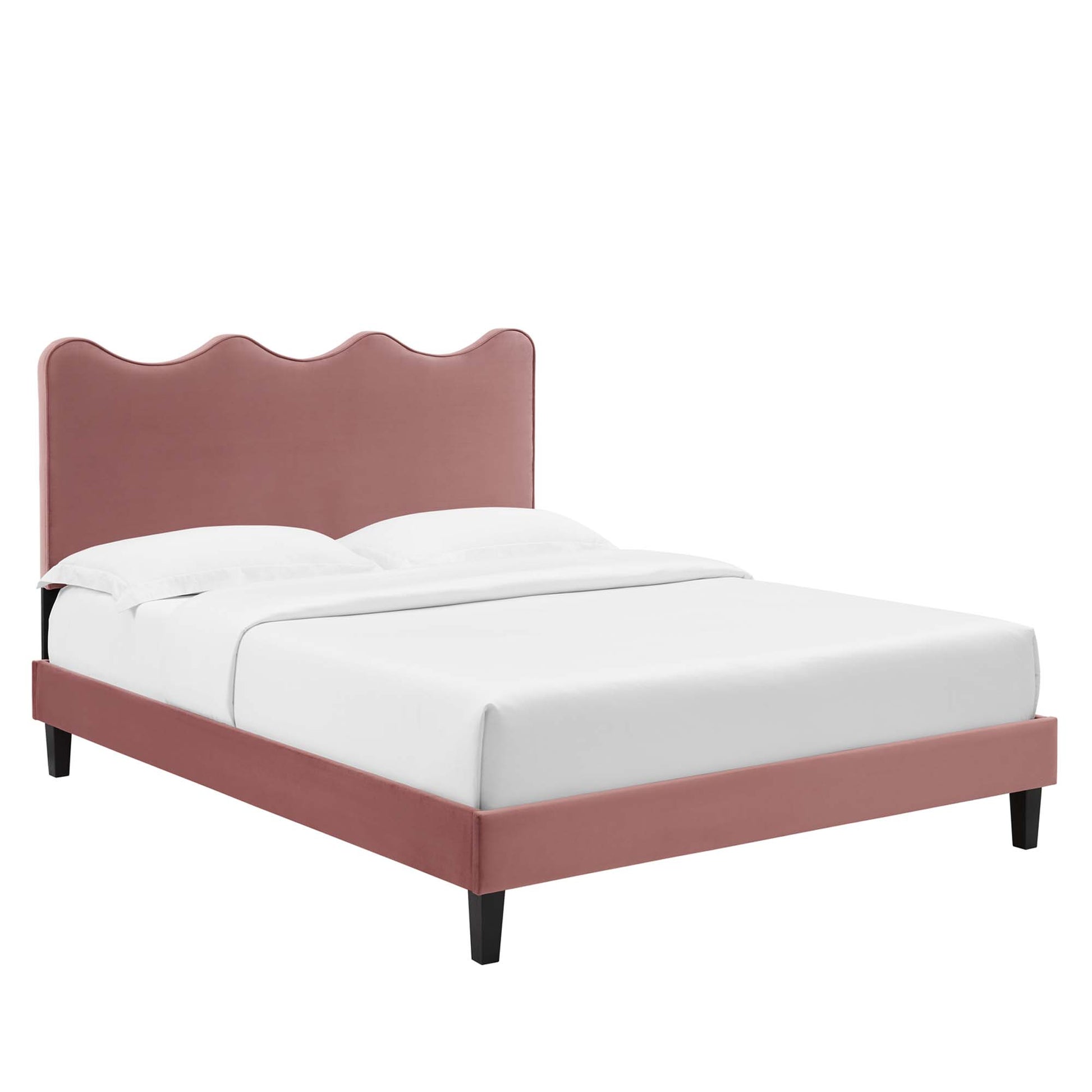 Red velvet upholstered queen platform bed with scalloped, wavy headboard and black tapered legs.