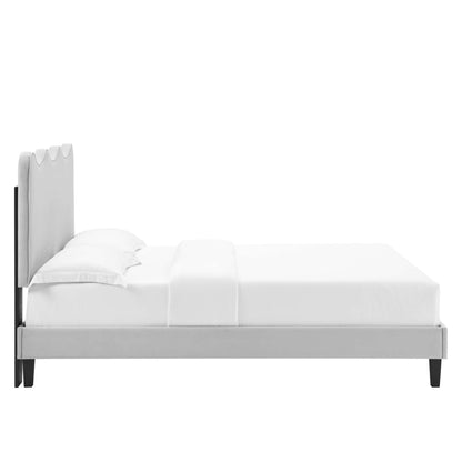 Modern upholstered platform bed in light gray fabric with tall tufted headboard & dark legs, white bedding.