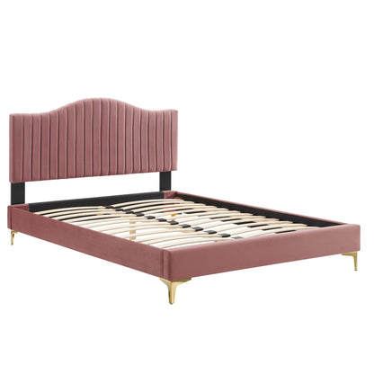Dusty-rose channel-tufted performance velvet king platform bed with black rails, gold tapered legs, & a wooden slat base.