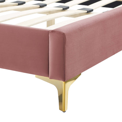 Dusty Rose velvet upholstered platform bed with gold metal legs and wooden slats